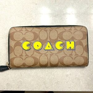 Limited edition Pac-Man x coach clutch